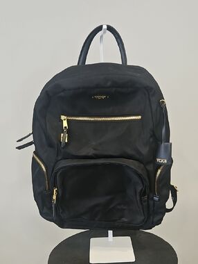 Tumi Black Backpack with Gold Zippers